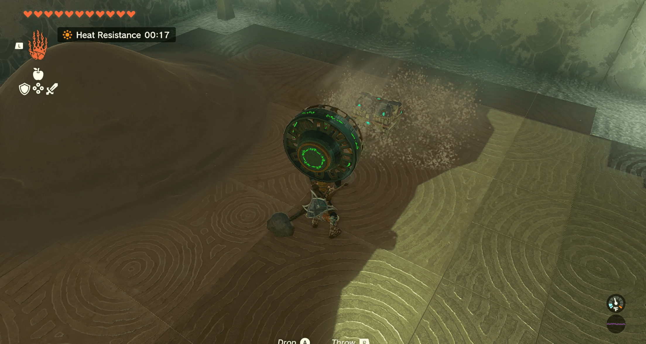 Blowing away sand to reveal a treasure chest in Zelda: Tears of the Kingdom