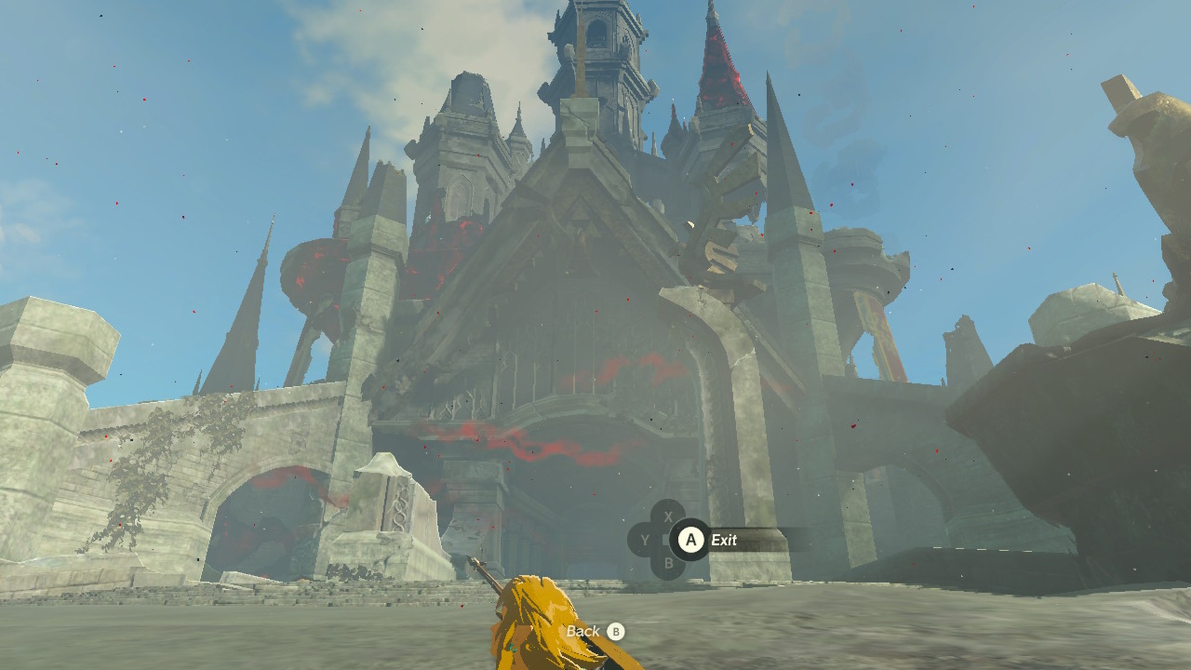 Link uses Ascend to pop out from a rock by Hyrule Castle in Zelda Tears of the Kingdom.