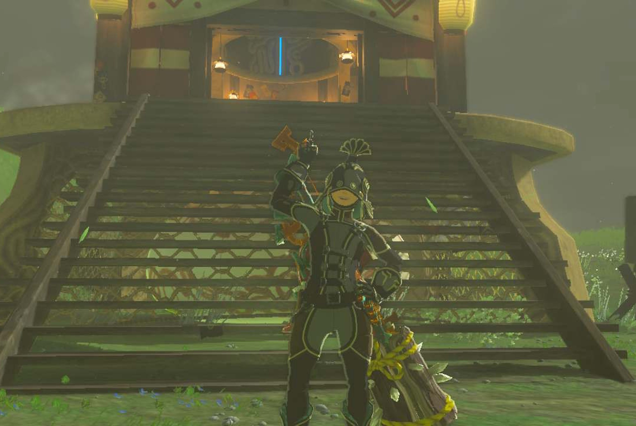 Link rocks the Rubber Armor set in front of a skyview tower in Zelda Tears of the Kingdom.