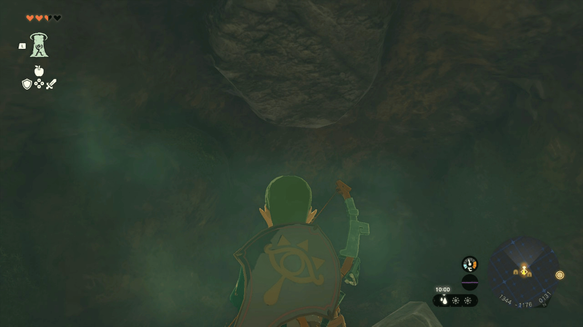 Link standing in a cave directly underneath the Sahasra Slope Tower