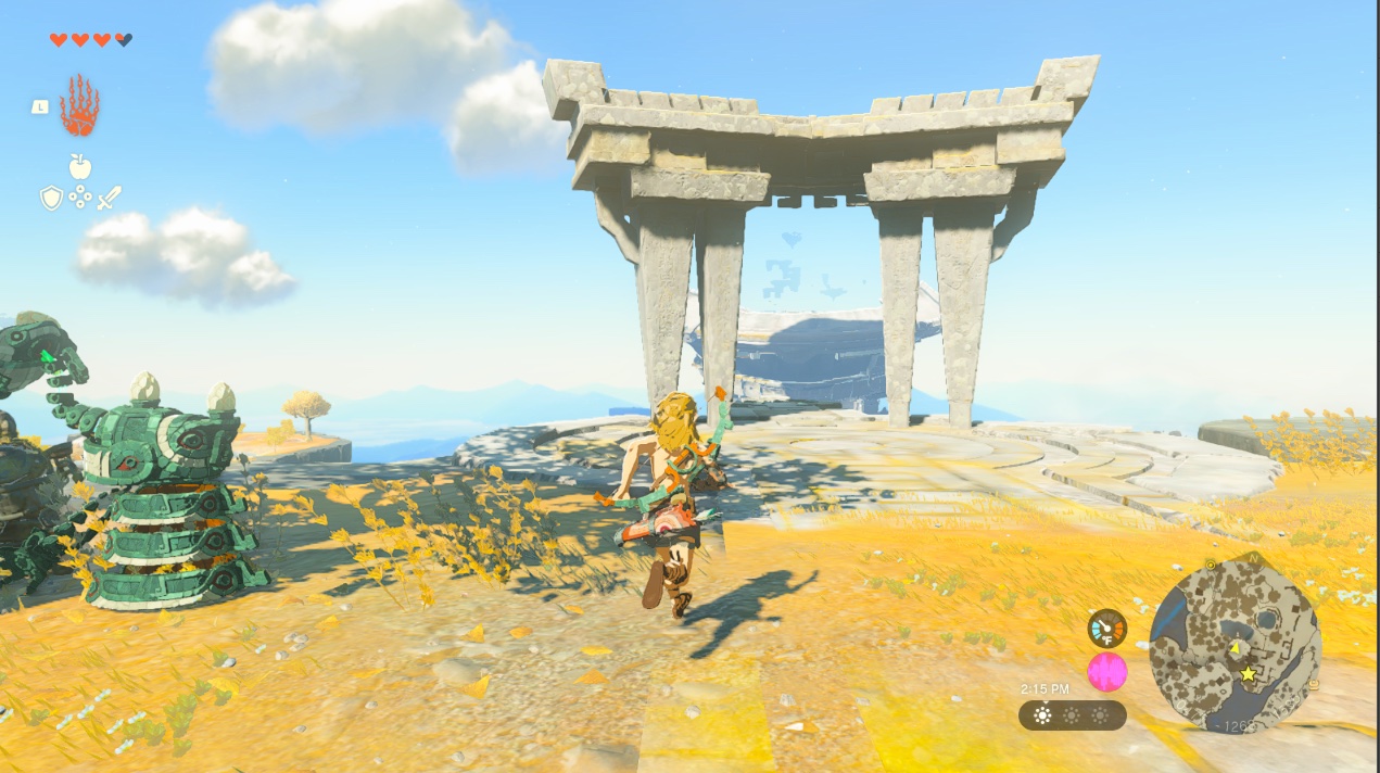 Link runs toward a stone gate on the Great Sky Island in Tears of the Kingdom.
