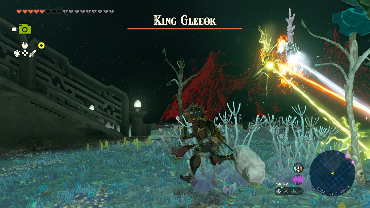 Link runs away from a King Gleeok in Zelda Tears of the Kingdom.