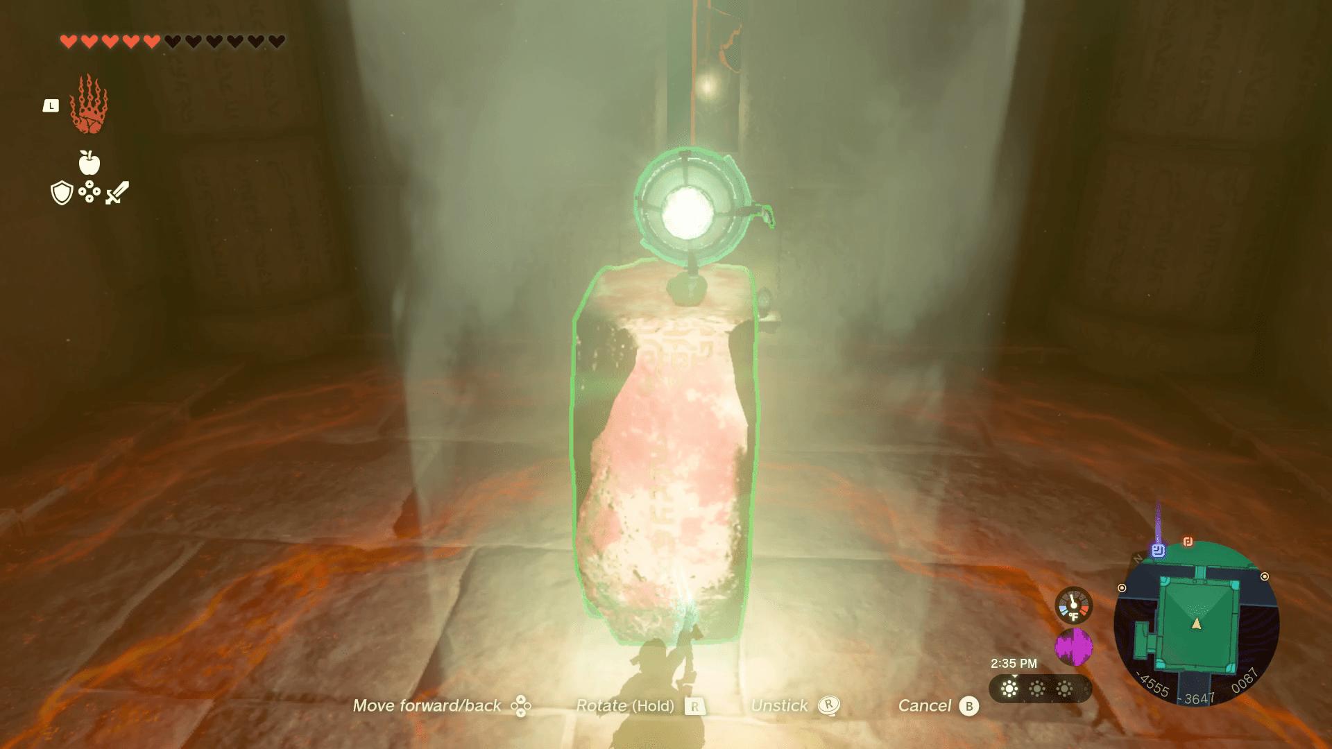 The Legend of Zelda: Tears of the Kingdom Link using Ultrahand to assemble a boulder and mirror in the Lightning Temple.