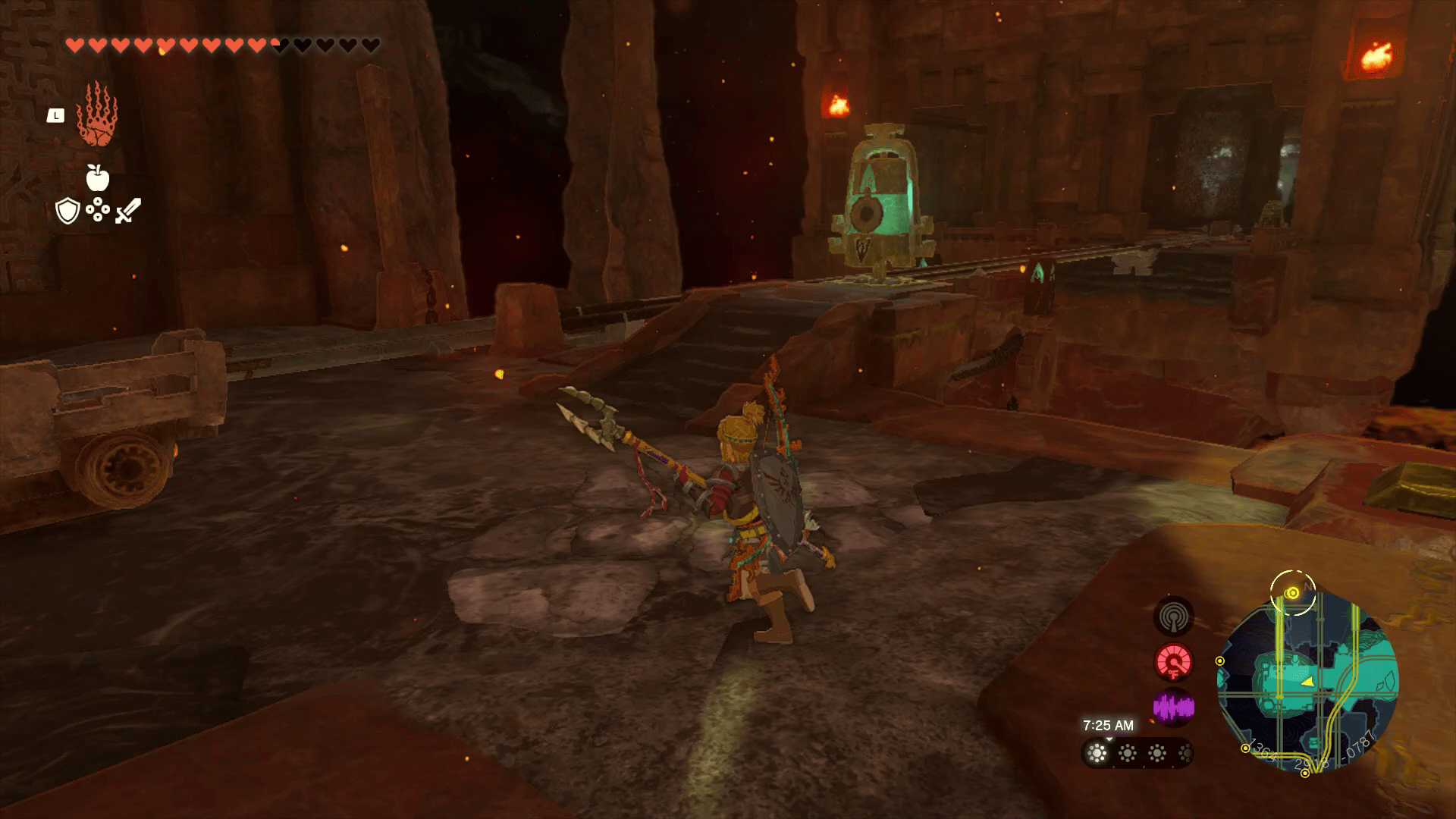 In Tears of the Kingdom, Link approaches another set of minecart tracks on the left side of a platform.