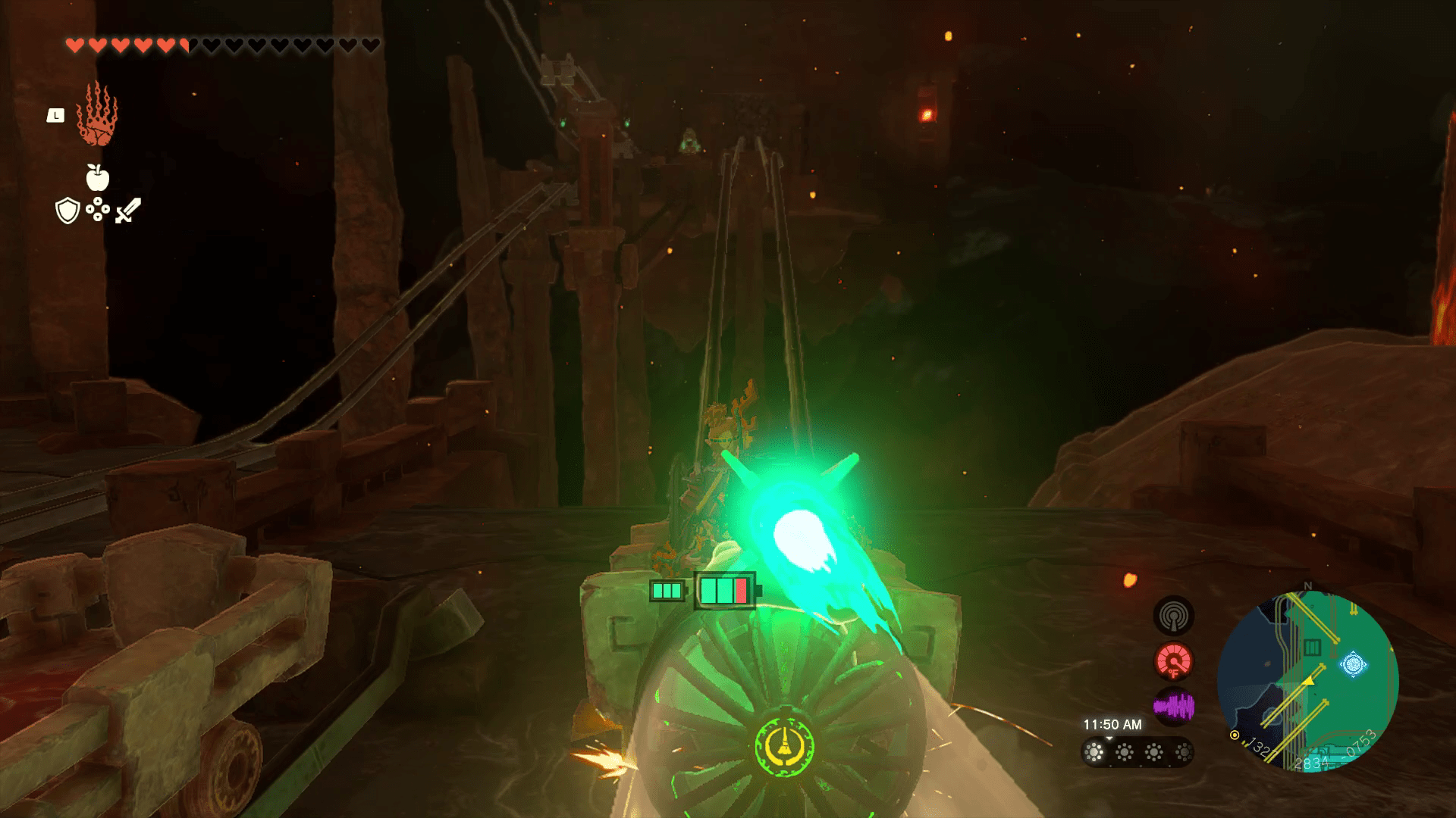 Link shoots up a ramped minecart track using a cart with a rocket on the end in Tears of the Kingdom