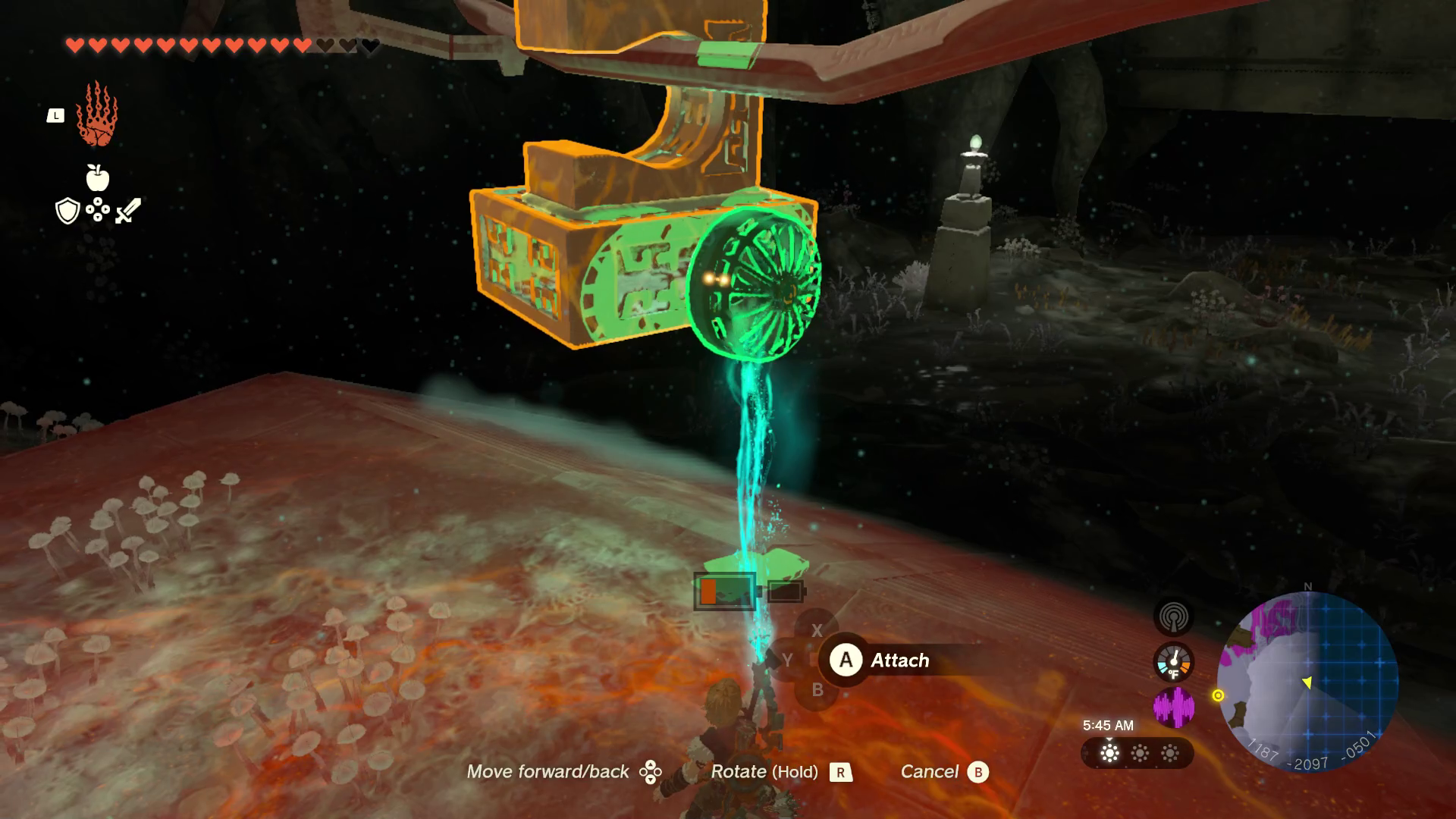 Link uses Ultrahand to attach a fan to the back of a box on a hook in Tears of the Kingdom