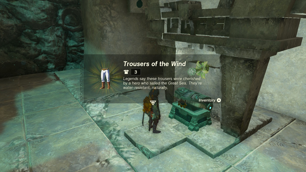 Link opens a chest containing the trousers of the wind in the Depths in Zelda Tears of the Kingdom.