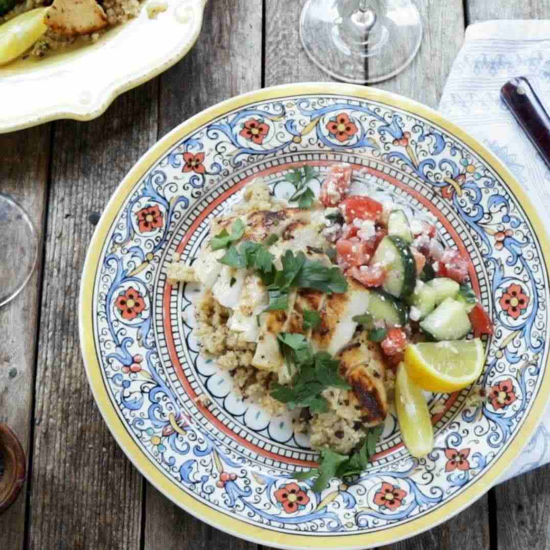 Zesty Lemon Chicken served with Couscous and Fresh Cucumber Salad.